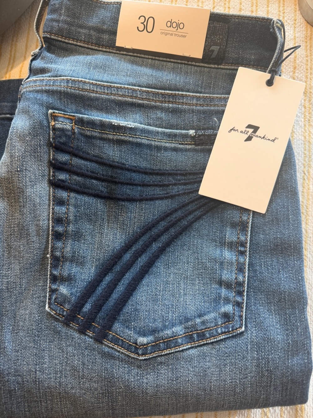 7 For All Mankind Medium Blue Flare Jeans with Dark Embroidered Arcs